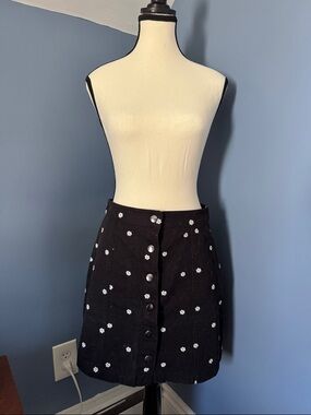 Black A-Line Button-Front Mini Skirt with White Floral Embroidery